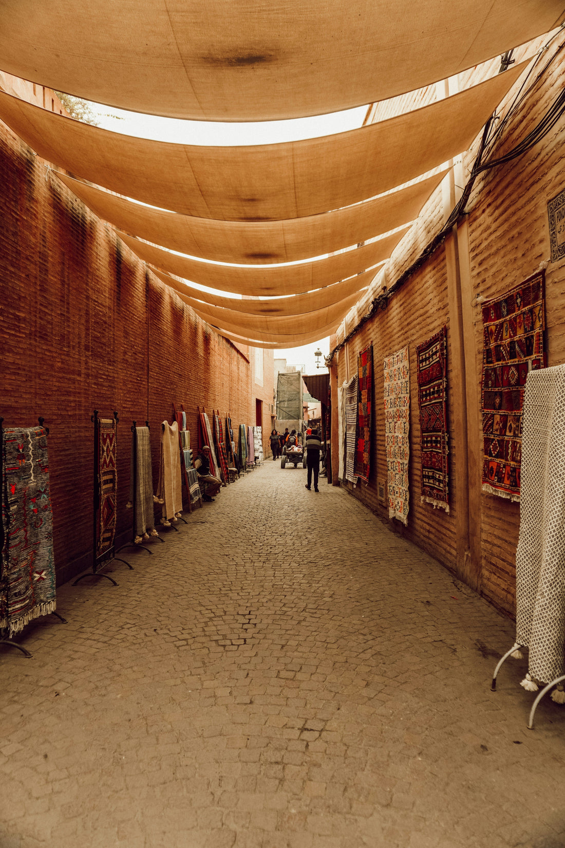 What are the primary types of Moroccan rugs?