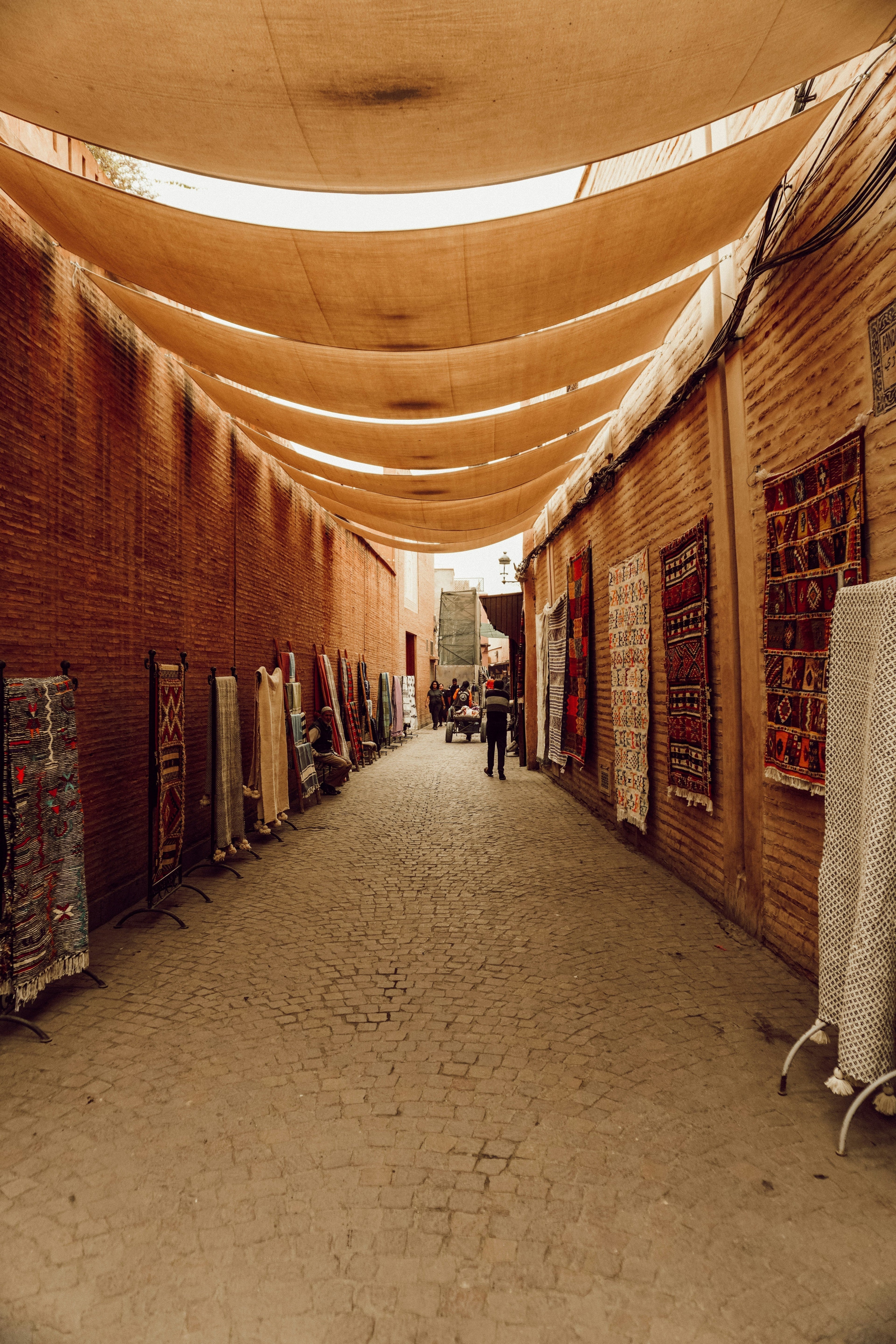 What are the primary types of Moroccan rugs?