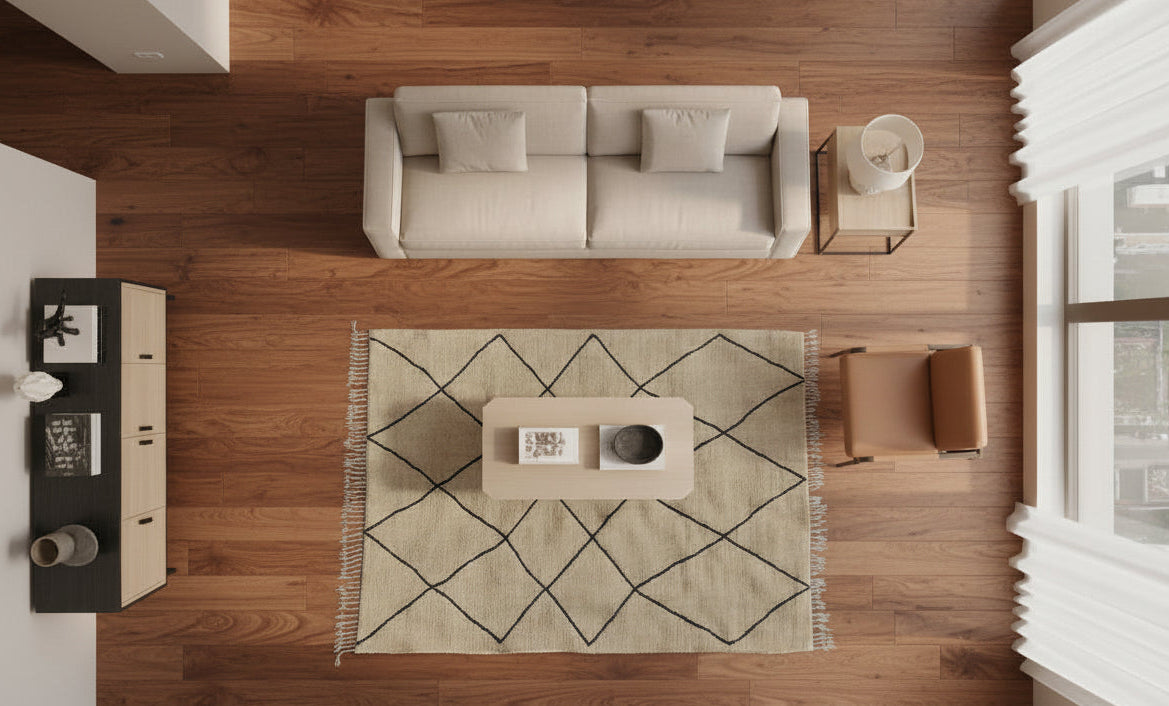 Modern living room with a beige sofa, armchair, and beni ouarain rug.